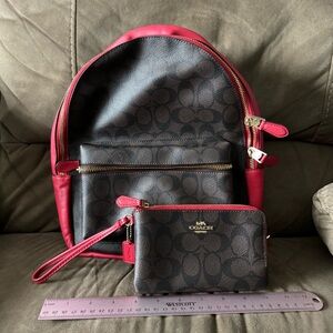 Red coach backpack with matching wristlet